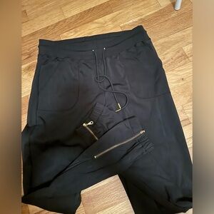 Zyia black jogger with gold zipper ankle